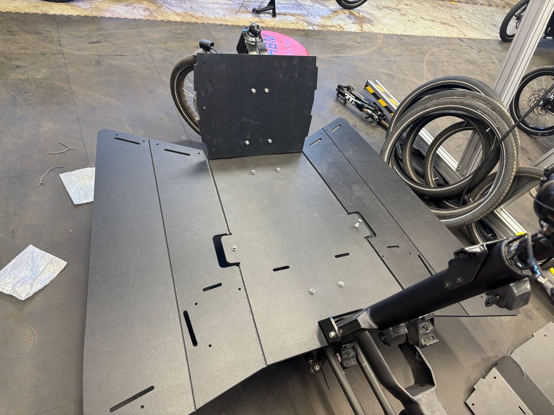 The recycled PP-foam carrier panels, cut and scored, before folding and assembly